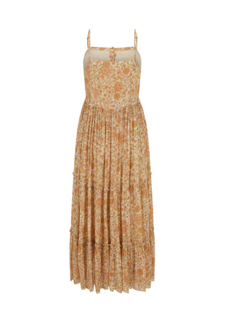 a-sleeveless-tiered-maxi-dress-with-thin-shoulder-straps-featuring-a-warm-orange-and-beige-floral-pattern-on-a-cream-background-shown-against-a-plain-white-backdrop